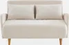 A cream-colored sofa with two pillows on a white background. Anteprima dell’immagine prodotto