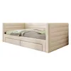 A beige upholstered daybed with two drawers underneath, shown from a side-angle. Podgląd zdjęcia produktu