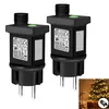 Two black power adapters for string lights are shown on a white background. A small inset image shows a Christmas tree decorated with lights plugged into a wall socket. Produktbild-Vorschau