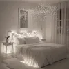 A bedroom decorated with fairy lights. Anteprima dell’immagine prodotto