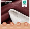 A close-up view of a burgundy sherpa-lined blanket, with icons and text indicating its features and uses. Náhled obrázku produktu