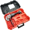 An angle grinder and its accessories are neatly arranged in a red and black plastic case. Náhled obrázku produktu