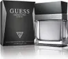 A product shot of Guess Seductive Homme Eau de Toilette and its packaging. Voir les images du produit