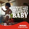 A baby wearing a diaper is standing and posing in a room. Náhľad obrázku produktu