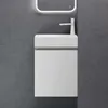 A modern white wall-mounted vanity and sink with a minimalist design. Voir les images du produit