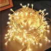 A tangled coil of warm white LED string lights. Voir les images du produit