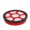 A circular red and white vacuum cleaner filter with a hexagonal pattern. Náhled obrázku produktu