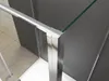 Close-up view of a shower enclosure corner, showing the frame and glass. Produktbild-Vorschau