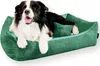 A dog is lying in a green dog bed. Náhled obrázku produktu
