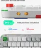 A close-up view of a white mechanical keyboard with green and red accents, showcasing its mode switching and wireless endurance features with text overlays. Produktbild-Vorschau