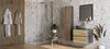 A modern bathroom with a sink, vanity, shower, and decorative elements. Náhled obrázku produktu