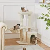 Three cats are playing on a multi-level cat tree in a living room. Produktbild-Vorschau