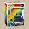 A Funko Pop! vinyl figure of Mickey Mouse in a rainbow color scheme, displayed in its original packaging. Produktbild-Vorschau