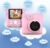 A pink LAMAX InstaKid1 camera is shown with various features highlighted by text labels in clouds. Anteprima dell’immagine prodotto