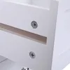 Close-up of a white cabinet with visible screws, showing the drawer slides. Anteprima dell’immagine prodotto
