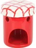 A red ceramic oil burner with a white lid featuring a red checkered pattern. Voir les images du produit