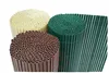 Three rolled-up pieces of privacy screen in different colors (cream, brown, and green) are shown against a white background. A section of the green screen is unrolled to show its structure. Produktbild-Vorschau