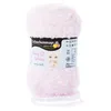A ball of pink yarn with a label showing a baby and product information. Anteprima dell’immagine prodotto