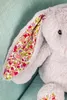 A close-up shot of a plush bunny's ear and part of its head. Náhľad obrázku produktu