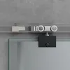 Close-up of a sliding glass door hardware system mounted on a track above a frosted glass panel. Produktbild-Vorschau