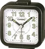 A close-up studio shot of a black Casio analog alarm clock with a white face. Podgląd zdjęcia produktu