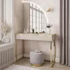A modern vanity table with a mirror and stool in a well-lit room. Produktbild-Vorschau