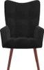A black velvet armchair with wooden legs, shown from the front against a white background. Produktbild-Vorschau