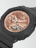 Close-up of a G-Shock watch face with a rose gold dial and gray casing. Anteprima dell’immagine prodotto