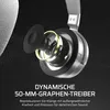 A close-up view of a headphone driver with text describing its features. Produktbild-Vorschau