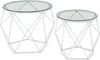 Two white geometric side tables with glass tops are shown against a white background. Náhled obrázku produktu
