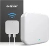 A white gateway device is shown next to its packaging, which has the word GATEWAY printed on it. Produktbild-Vorschau