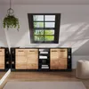A modern living room with a sloped ceiling, featuring a modular cabinet system under a window. Produktbild-Vorschau