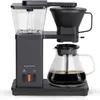 A black CoolHome Masterbrew Kaffeemaschine filter coffee maker with a glass carafe filled with coffee, shown on a white background. Produktbild-Vorschau