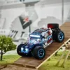 A remote-controlled off-road truck on a wooden ramp. Produktbild-Vorschau