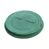 A green manhole cover on a white background. Produktbild-Vorschau