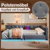 A gray upholstered daybed with LED lighting underneath, featuring a tufted headboard and a tablet on the headboard. Produktbild-Vorschau