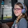 A young girl wearing headphones and glasses is sitting in a car, looking to the side. Text overlays describe the product's features. Produktbild-Vorschau