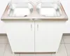 A white double sink cabinet with a stainless steel sink top. Voir les images du produit