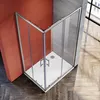 A modern corner shower enclosure with sliding doors, set against a contrasting orange wall and a grey tiled wall, on a wooden floor. Náhľad obrázku produktu