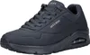 A single navy blue Skechers Uno Stand On Air sneaker is shown from a side-angle on a white background. Voir les images du produit