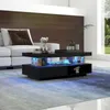 A modern living room with a white sofa and a black coffee table with LED lighting. Anteprima dell’immagine prodotto