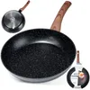 A frying pan with a granite-like finish and a wooden handle is displayed against a white background. Smaller images show the bottom of the pan and a packaged version with an egg frying. Produktbild-Vorschau