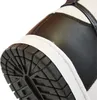 A close-up view of the sole and side of a black and white Nike sneaker. Náhľad obrázku produktu