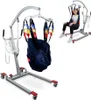 A patient lift with a sling and a woman using it. Produktbild-Vorschau