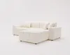 A cream-colored sectional sofa is displayed on a white background. Náhled obrázku produktu