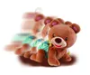 A brown plush bear toy is shown in a crawling motion, with multiple blurred images indicating movement. Produktbild-Vorschau