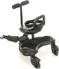 A black and gray stroller board with a seat and handlebars, shown against a white background. Náhľad obrázku produktu
