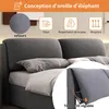 A close-up view of a bed with a gray upholstered headboard and pillows, featuring marketing text and icons highlighting product features. Náhled obrázku produktu