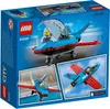 The image shows the packaging of a LEGO City Stunt Plane set, featuring the toy plane and a pilot minifigure. There are also smaller inset images of the plane in action. Podgląd zdjęcia produktu