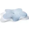 A close-up, studio shot of a blue and white ergonomic pillow. Produktbild-Vorschau